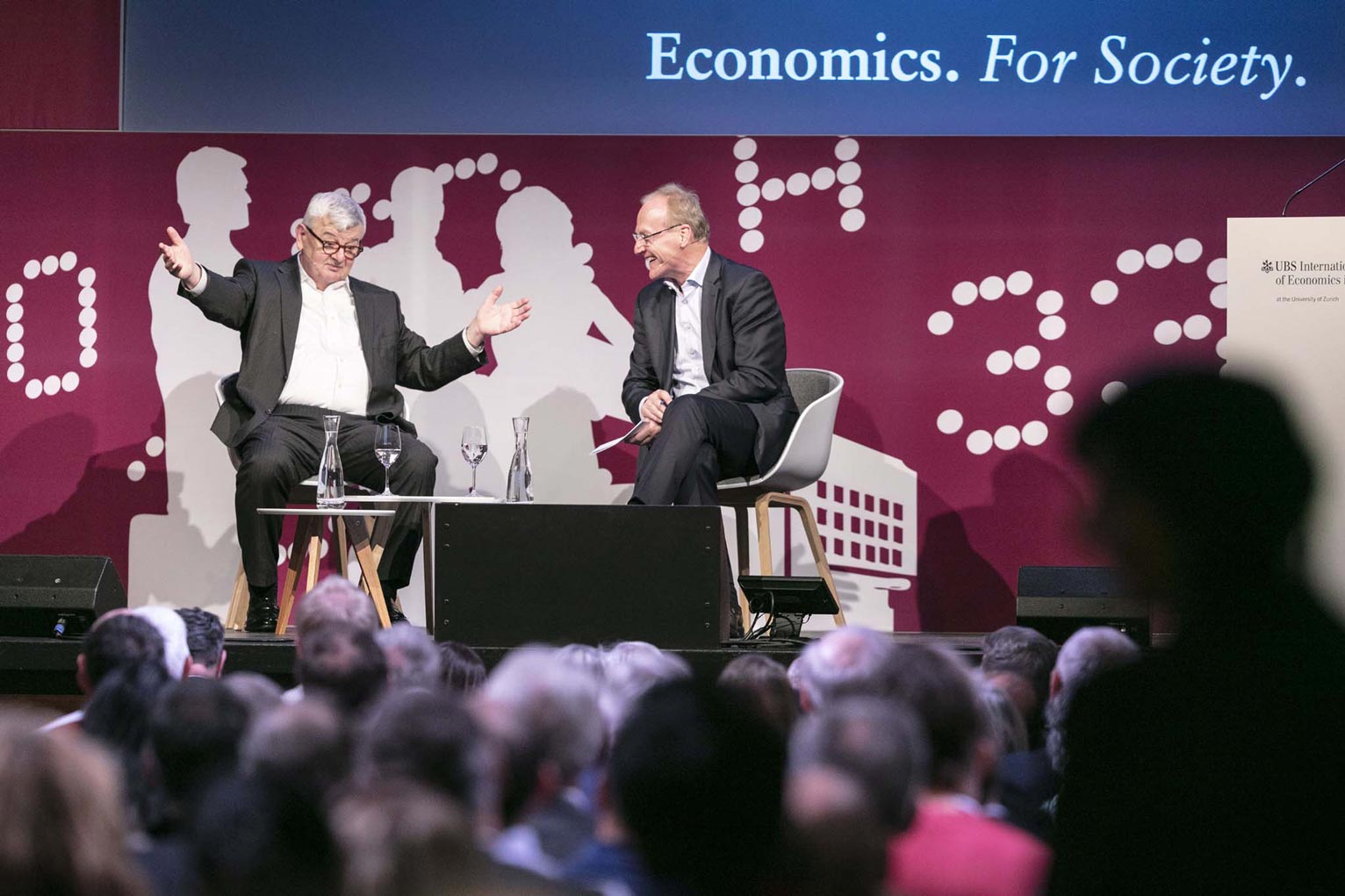 UBS Center Director Ernst Fehr (on the right) in conversation with Joschka Fischer, Former Foreign Minister and Vice Chancellor of Germany.