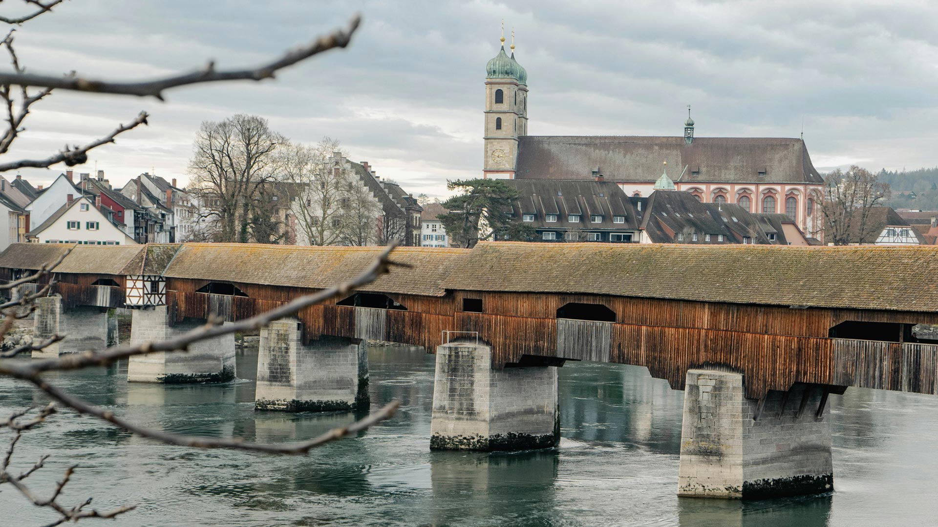 The Säckingerbrücke is a bridge over the Rhine, connecting the German city of Bad Säckingen with the village of Stein in Switzerland. It is the longest roofed wooden bridge in Europe. The bridge was built in 1272 and was destroyed several times (1570, 1633, 1678). The current bridge was completed in 1700. Ryan Lee via Unsplash
